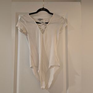 Charlotte Russe Cream Crisscross V-Neck Bodysuit